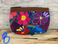 Embroidered flower clutch